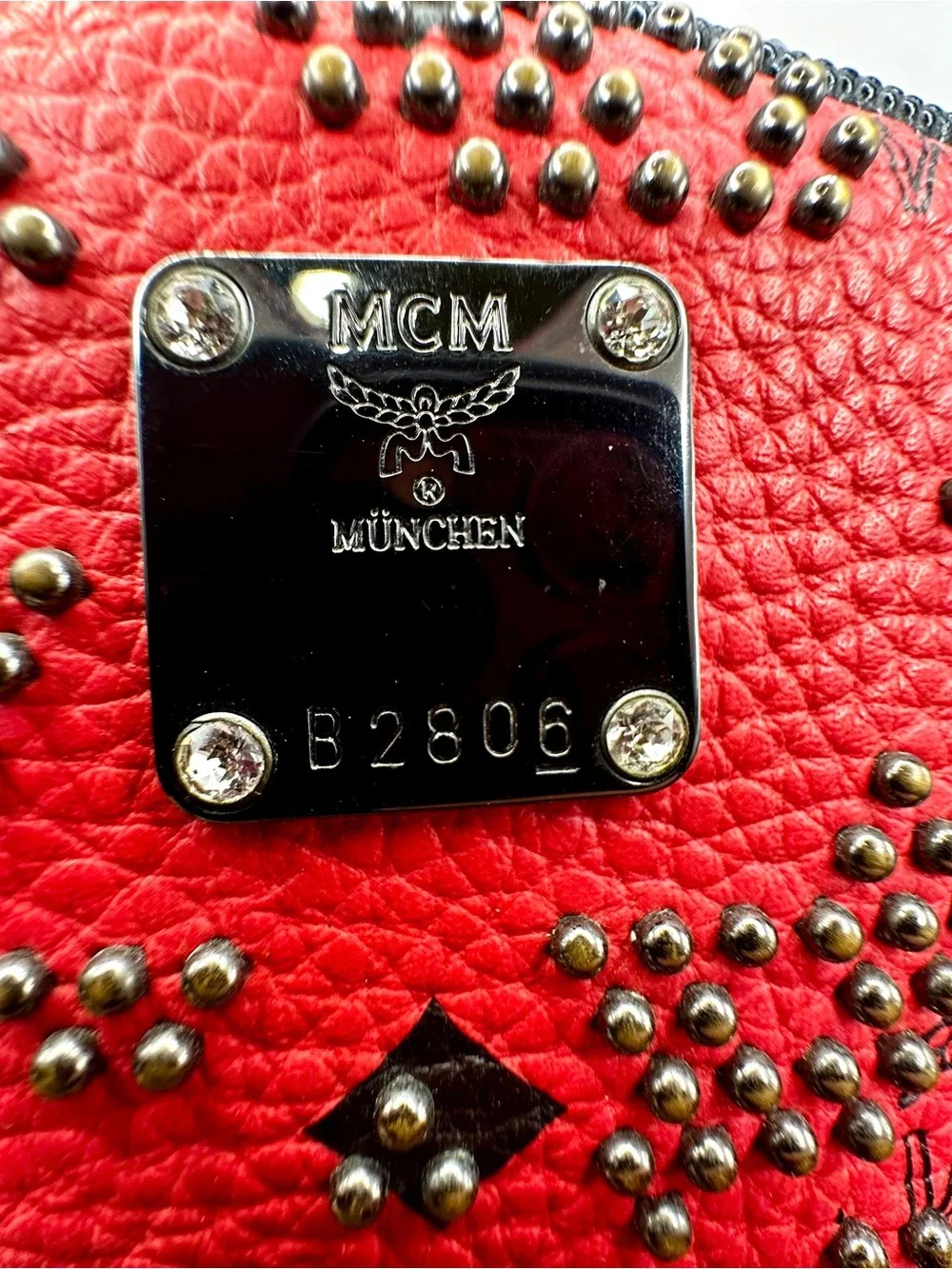MCM Stark Red Leather Studded Backpack with Black Trim